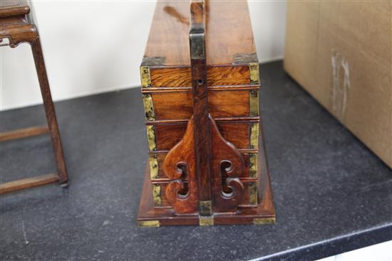 A Chinese huanghuali and brass mounted four section picnic basket, 19th century, width 36cm height 31cm